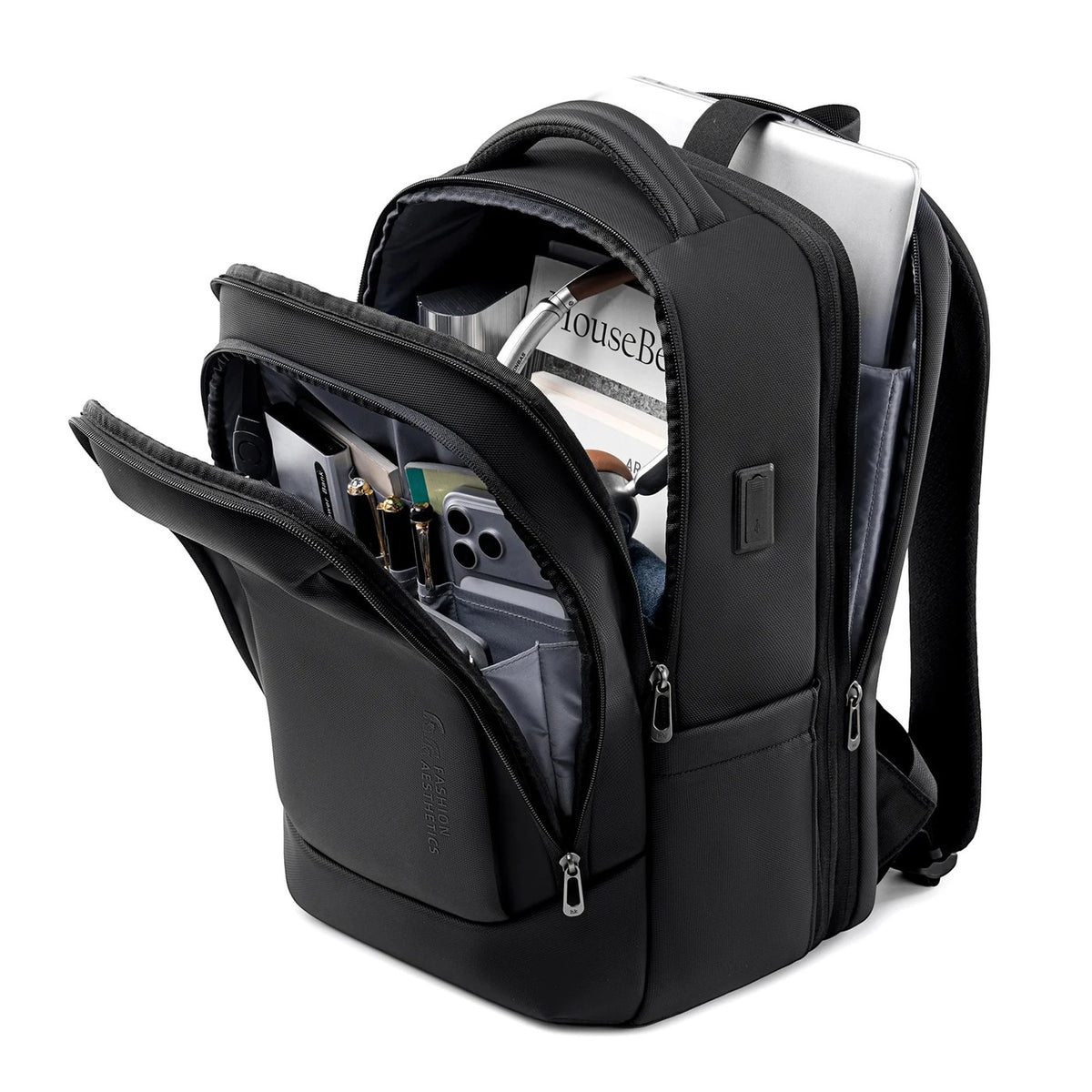 Mochila expansible de 17" con puerto USB y bolsillo antirrobo